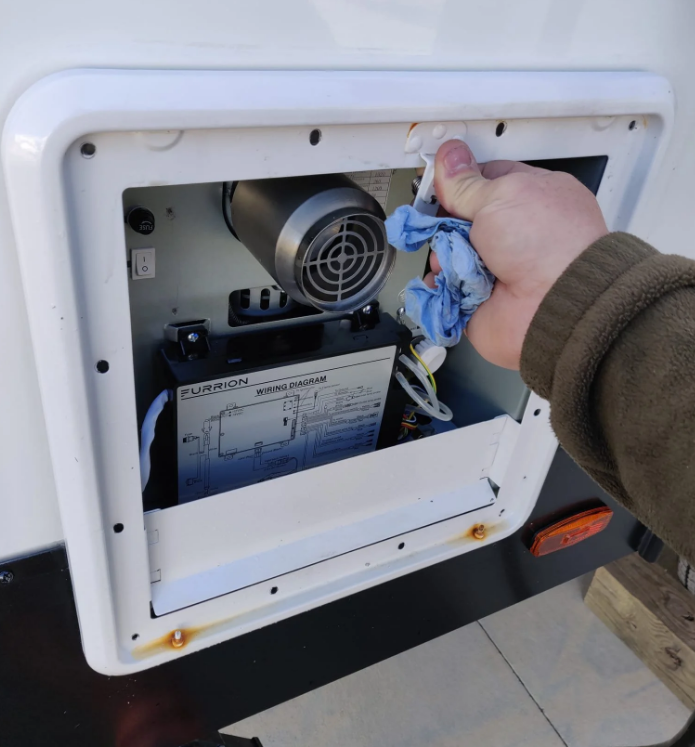 RV water pump showing signs of failure